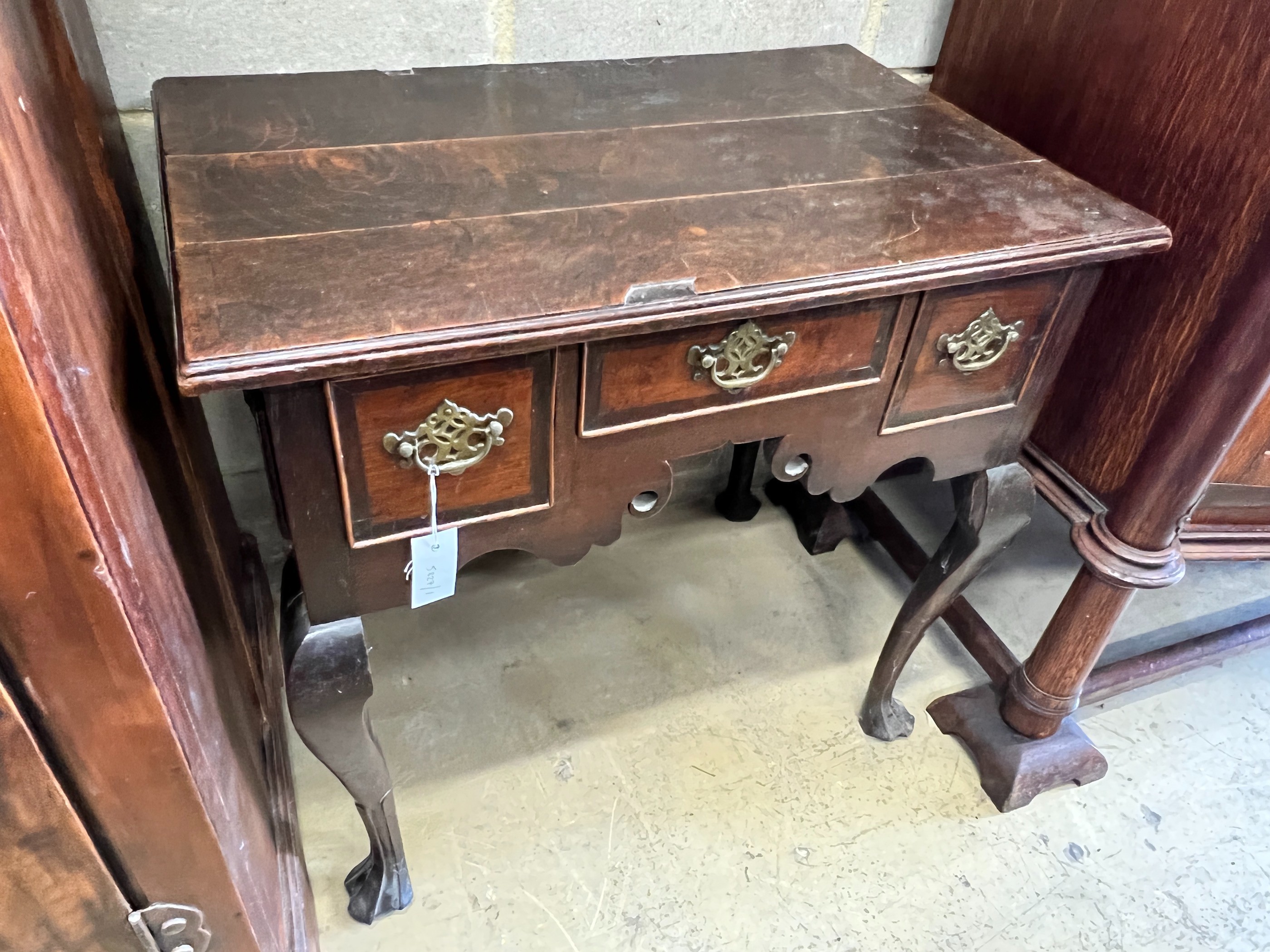 A George III banded oak lowboy, width 77cm, depth 50cm, height 72cm